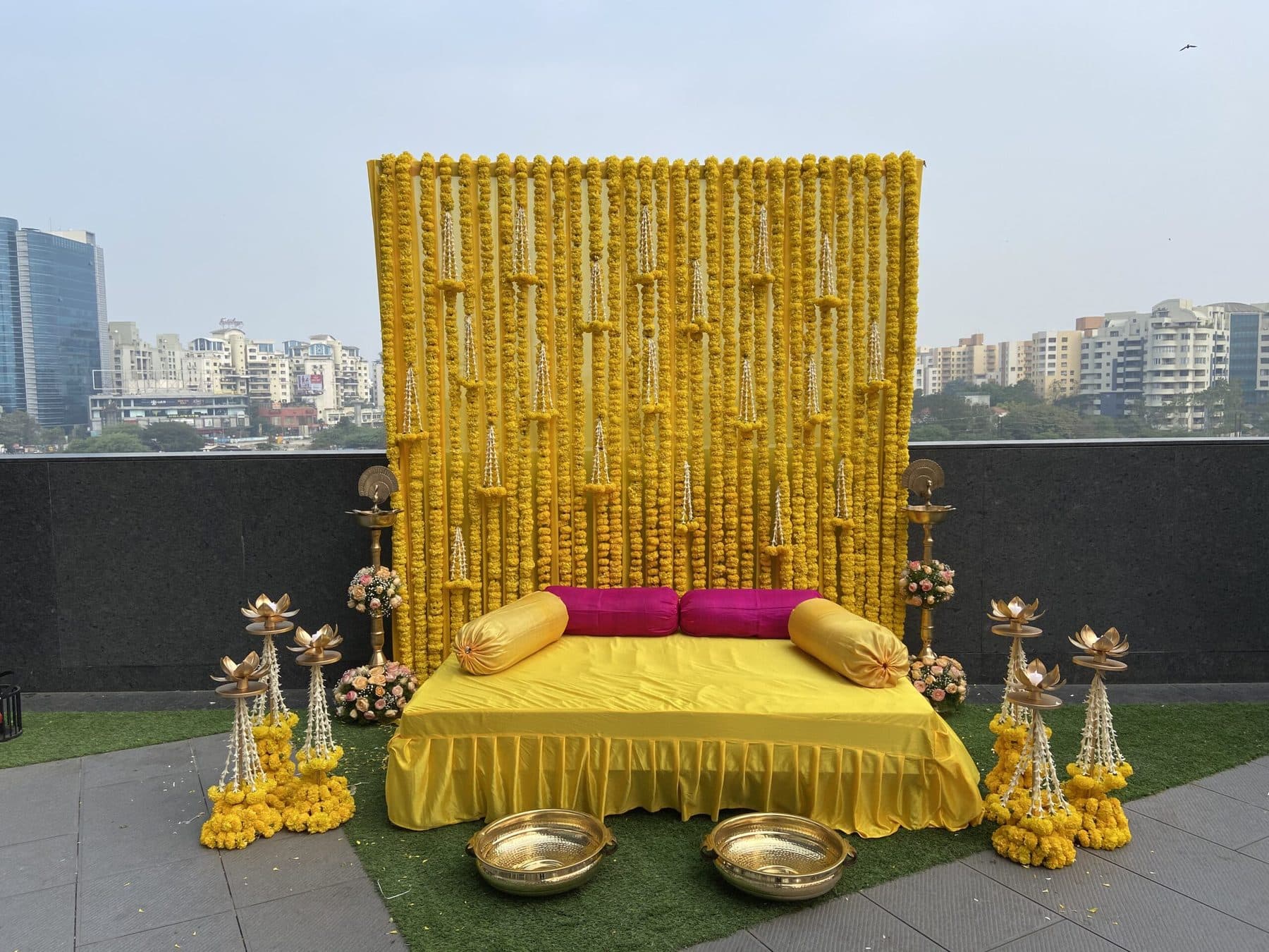 A haldi ceremony setup with marigold décor